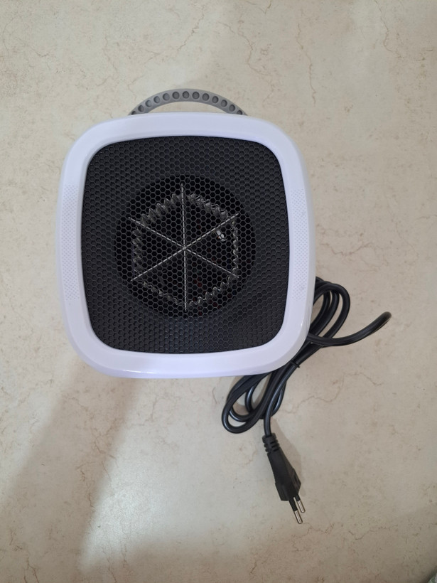 بخاری برقی مینی و فن هیتر هوشمند طرح تلوزیون فانتزی (Intelligent Heater)